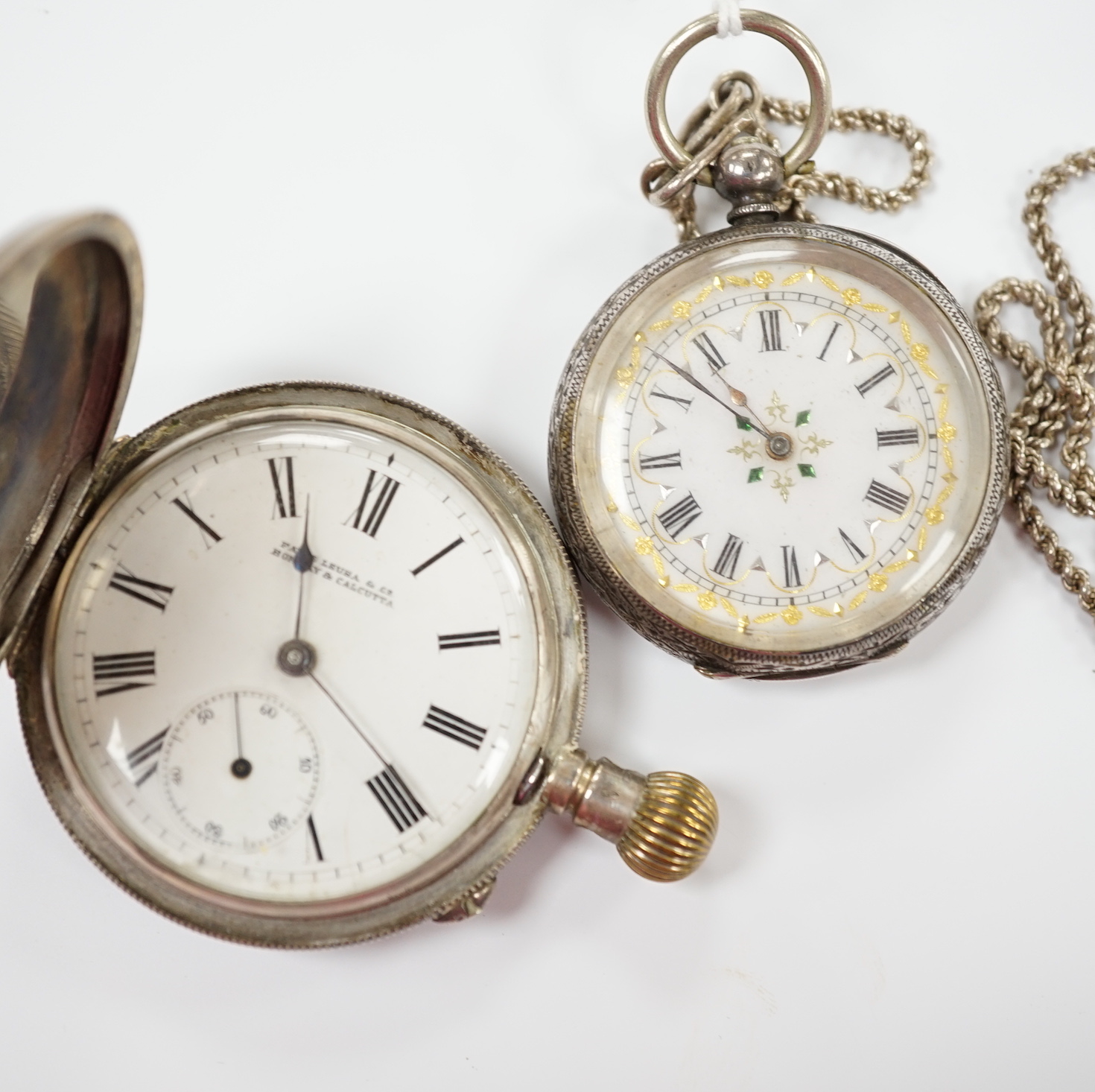 A 900 standard white metal hunter keyless pocket watch and a Swiss 933 standard white metal fob watch.